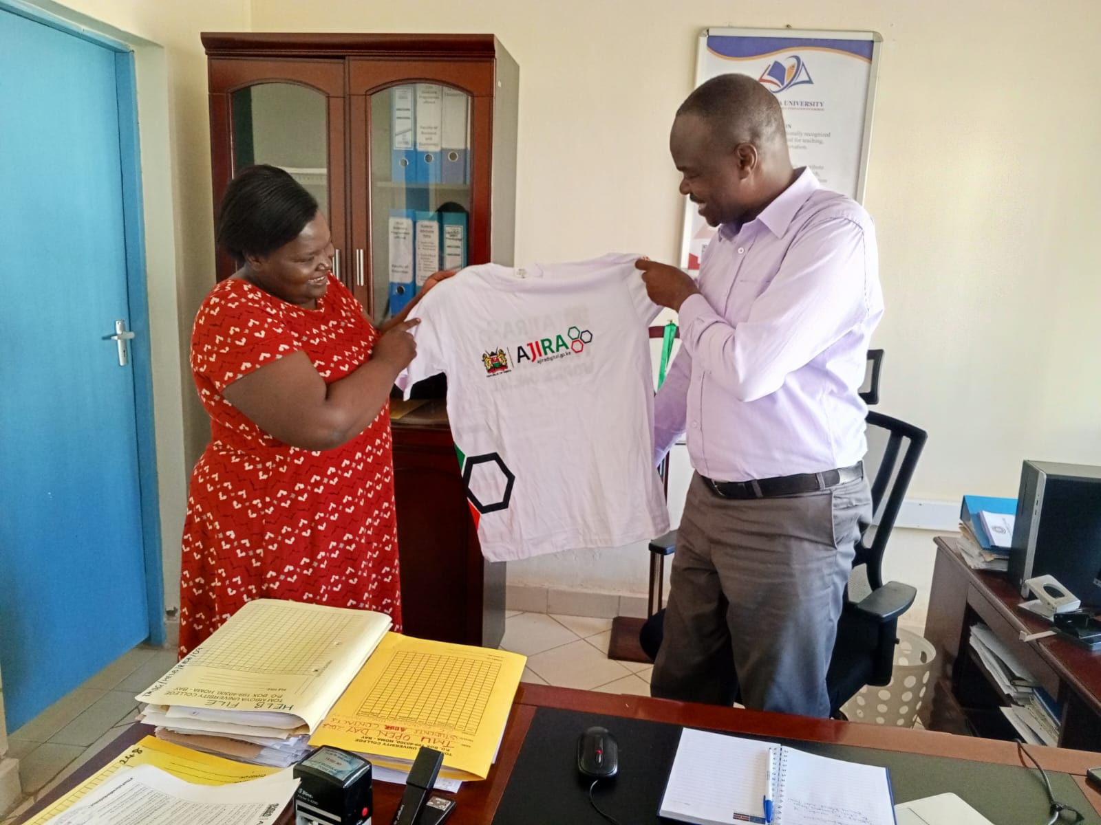 From Left: Beatrice Mwangemi, Ajira Program Operations and Mr. Jared Malela Registrar Academic & Student Affairs